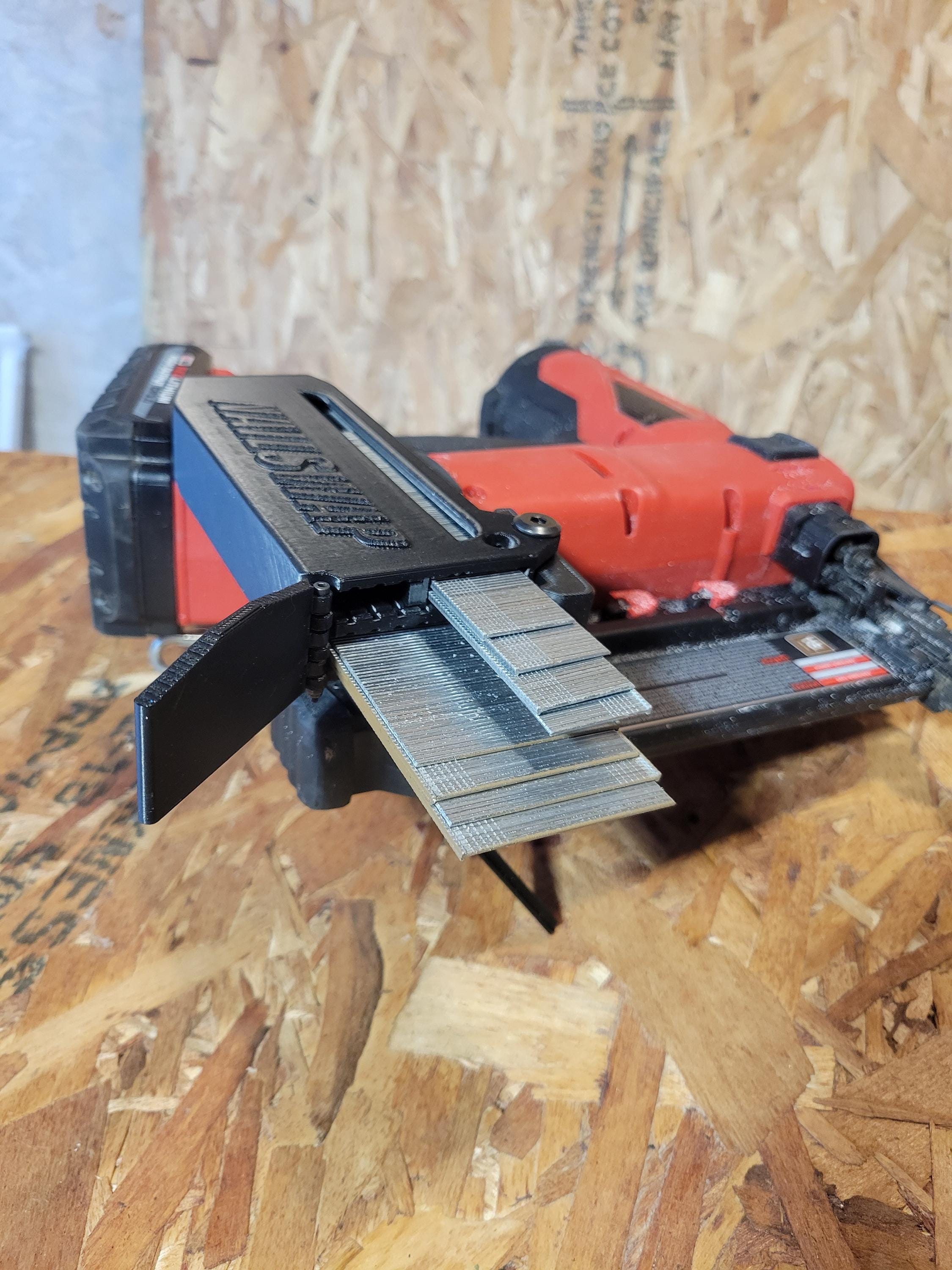 NAILSWAP M18 brad nailer compartment loaded with brads